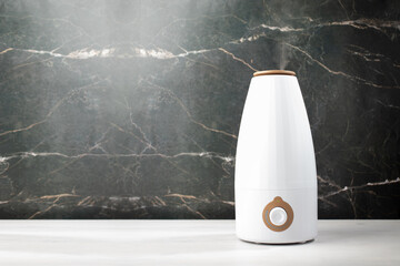 air humidifier on marble background