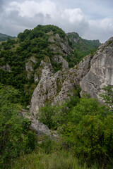 Jelasnicka Klisura and the view from the Prozorac lookout point on the huge rocks and meadows that spread across the mountain (Jelasnica Klisura, Suva planina).