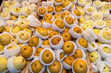 Chinese pears, Snow pears in wooden basket for selling in supermarket