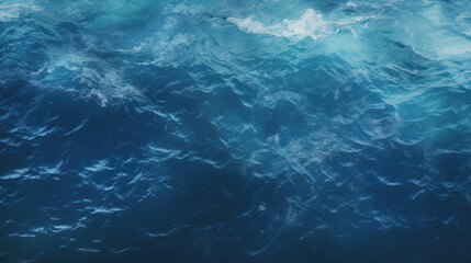 Deep blue sea with waves and water surface .