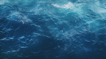 Deep blue sea with waves and water surface .