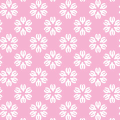 Simple white floral pattern on pink background. Seamless wallpaper texture. Vector illustration for design