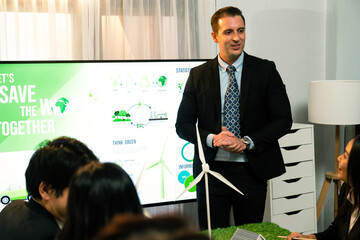 Businessman leader give presentation on eco-friendly implementation in order to reduce CO2 emission...