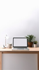 Modern workplace with laptop, coffee cup and houseplant on wooden table