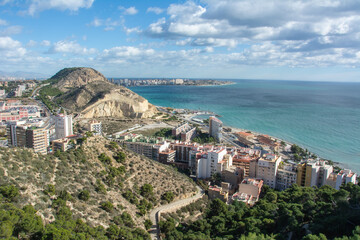 View of the Mediterranean Coast with Sierra Grossa or Sierra de San Julian mountain from the Castle of Santa Barbara in Alicante, Spain