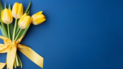 Yellow Tulips and a blue Background. Romantic Banner for women's day, happy birthday, mother's day, anniversary celebration theme