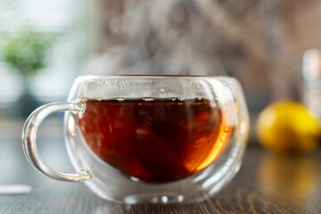 Steaming Hot Tea in a Clear Glass Cup