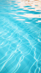 Blue water in swimming pool with sun reflection - can be used as background