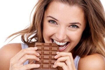 Woman, eating chocolate and portrait, candy and sweet tooth with pleasure and craving sugar on...