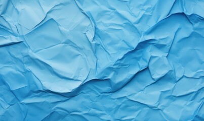 Blue crumpled paper background. Texture of crumpled paper.