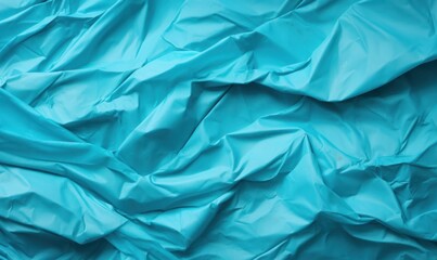 Blue crumpled paper background. Close up of crumpled blue paper.