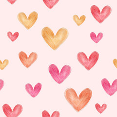 seamless pattern with multi-colored hearts on a light pink background