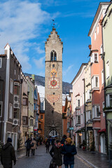 Naklejka na ściany i meble Vipiteno (Bolzano), Italy, 01.01.2024: view of the city center with the bell tower in the background.