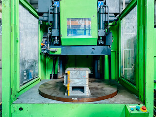 Injection moulding machine in factory.