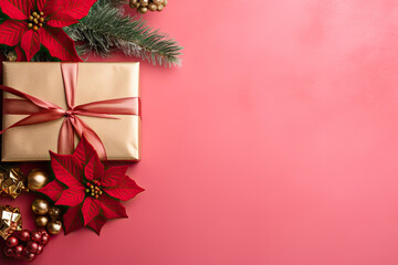 Christmas background with red poinsettia and gift box on red background