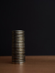 coins are arranged in the form of a building