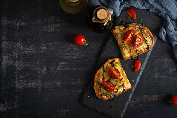 Hot sandwich with caramelized onion and cheese. Roasted bread toast