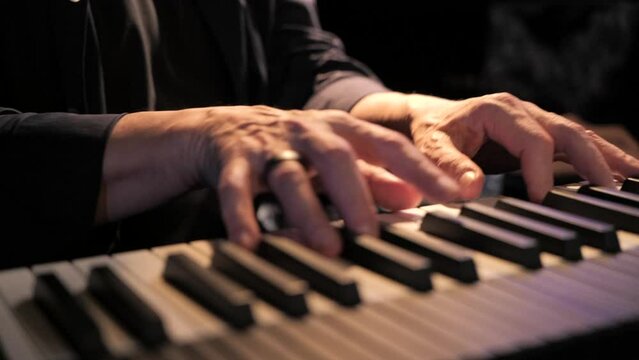 Pianist playing on stage