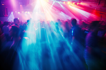Blurred Dance Floor with Colourful Lights.
A motion-blurred scene of a vibrant dance floor lit with dynamic, colourful lights. 