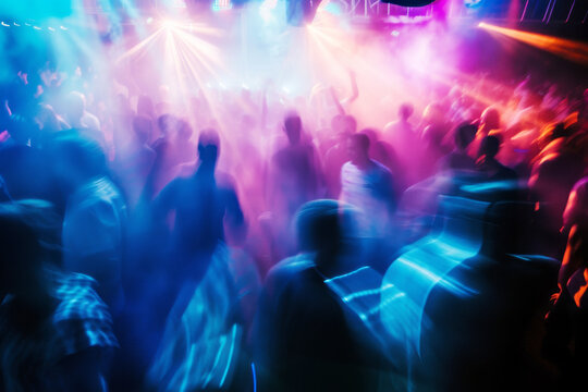 Blurred Dance Floor with Colourful Lights.
A motion-blurred scene of a vibrant dance floor lit with dynamic, colourful lights. 