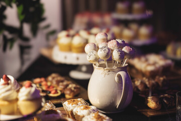 Decadent Delights: A Gourmet Table Overflows With Homemade Desserts and Irresistible Cupcakes