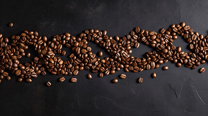 Scattered roasted coffee beans forming a dynamic pattern on a dark background