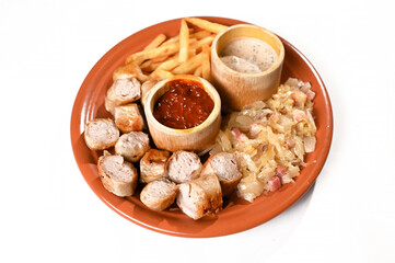schupfnudeln French fries with sauerkraut Weisswürst white sausage typical German food