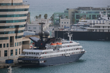 Small luxury expedition cruiseship cruise ship liner Corinthian in yacht marina port of Barcelona,...