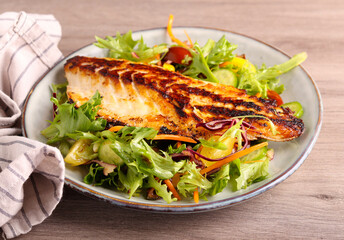 Fried sea bass fish fillet