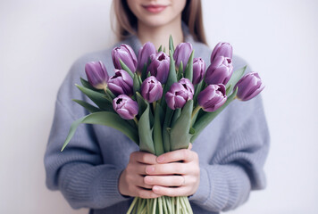 Woman with a bouquet of flowers