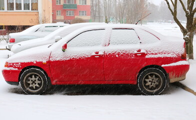 Minsk. Belarus. February 16, 2021. A passenger car littered with snow in winter.