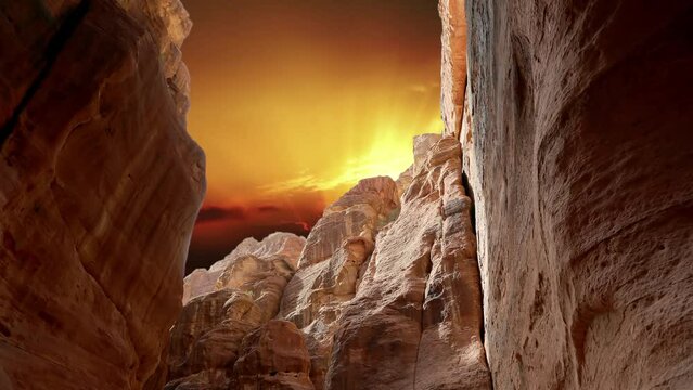 Mountains of Petra (against the background of the sunset, 4K, time lapse), Jordan, Middle East. Petra has been a UNESCO World Heritage Site since 1985 