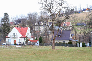 RABA WYZNA, POLAND - JANUARY 26, 2024: Residential buildings in the center of Raba Wyzna