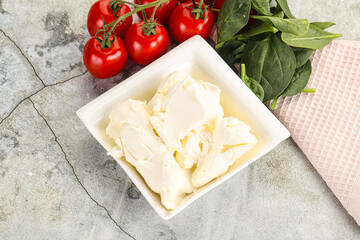 Soft cream cheese in the bowl