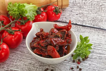Fotobehang Sun dried tomato with olive oil © Andrei Starostin