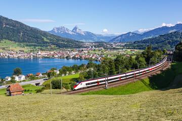 Passenger train type Stadler Giruno of Schweizerische Bundesbahnen SBB at Grosser Mythen mountain...