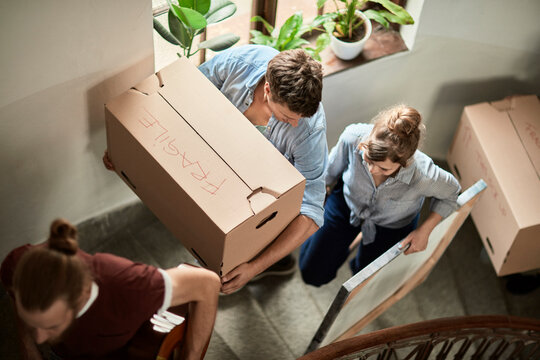Group of students moving into the college dorm