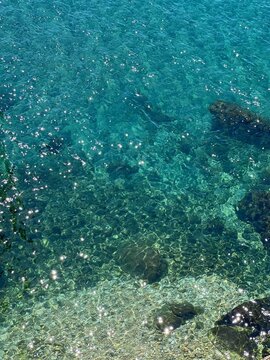 Blue glittering amazing sea water.