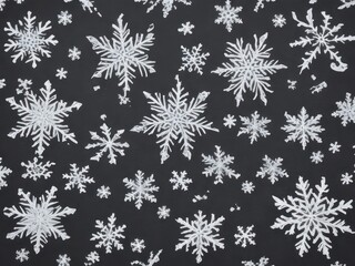 Naklejka na ściany i meble Snowflake texture on a black background