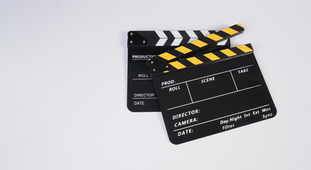 Naklejka premium Two Clapper board or movie slate on white background..