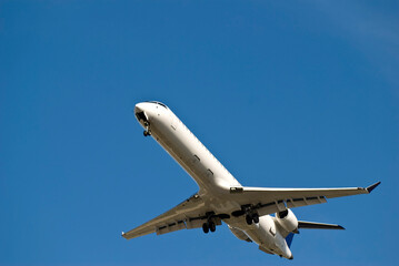 Airplane in midair. High quality photo - 721489073