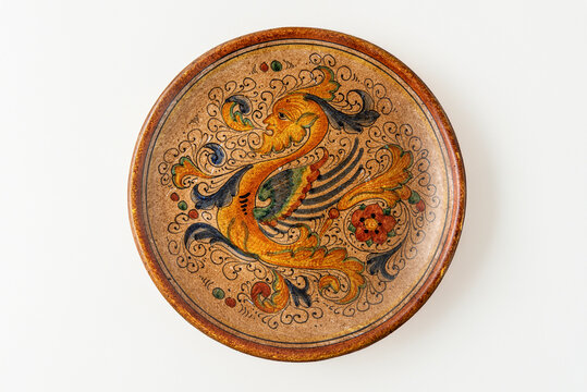 ceramic plate from deruta manufactory with Raphaelesque renaissance style decoration on white horizontal background