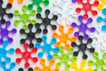 Flat lat view at colorful star shaped connector blocks on a white background