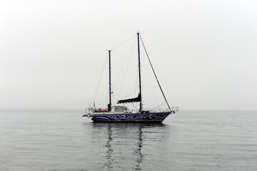 Sailing ship off the coast of the Bruce Peninsula in Peter the Great Bay of the Sea of Japan