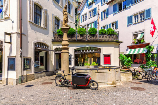 Retro bike in an atmospheric yard with great architecture, Zurich centre, Switzerland