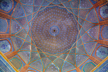 Beautiful traditional ceiling, mosaic of golden, blue and orange colors in Shah Jahan Mosque in Thatta, Pakistan. Also known as Jamia Masjid of Thatta. 