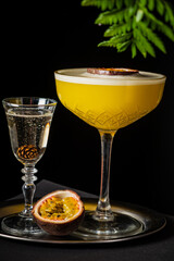 mocktail with passion fruit on tray