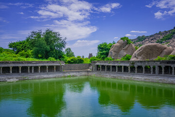 Elephant Tank at Gingee Fort or Senji Fort in Tamil Nadu, India. It lies in Villupuram District, built by the kings of konar dynasty and maintained by Chola dynasty. Archeological survey of india. - obrazy, fototapety, plakaty