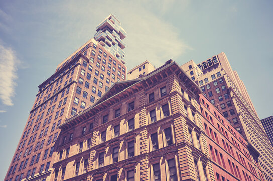Retro stylized picture of New York diverse architecture, Manhattan, USA.