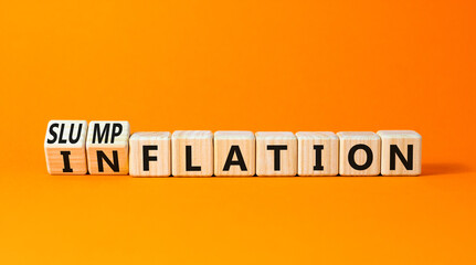 Inflation or slumpflation symbol. Concept word Inflation Slumpflation on beautiful wooden cubes. Beautiful orange table orange background. Business inflation slumpflation concept. Copy space.